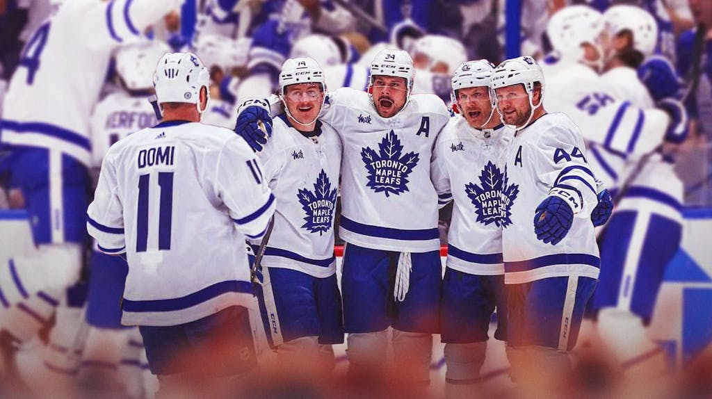 Maple Leafs players celebrating in joy.