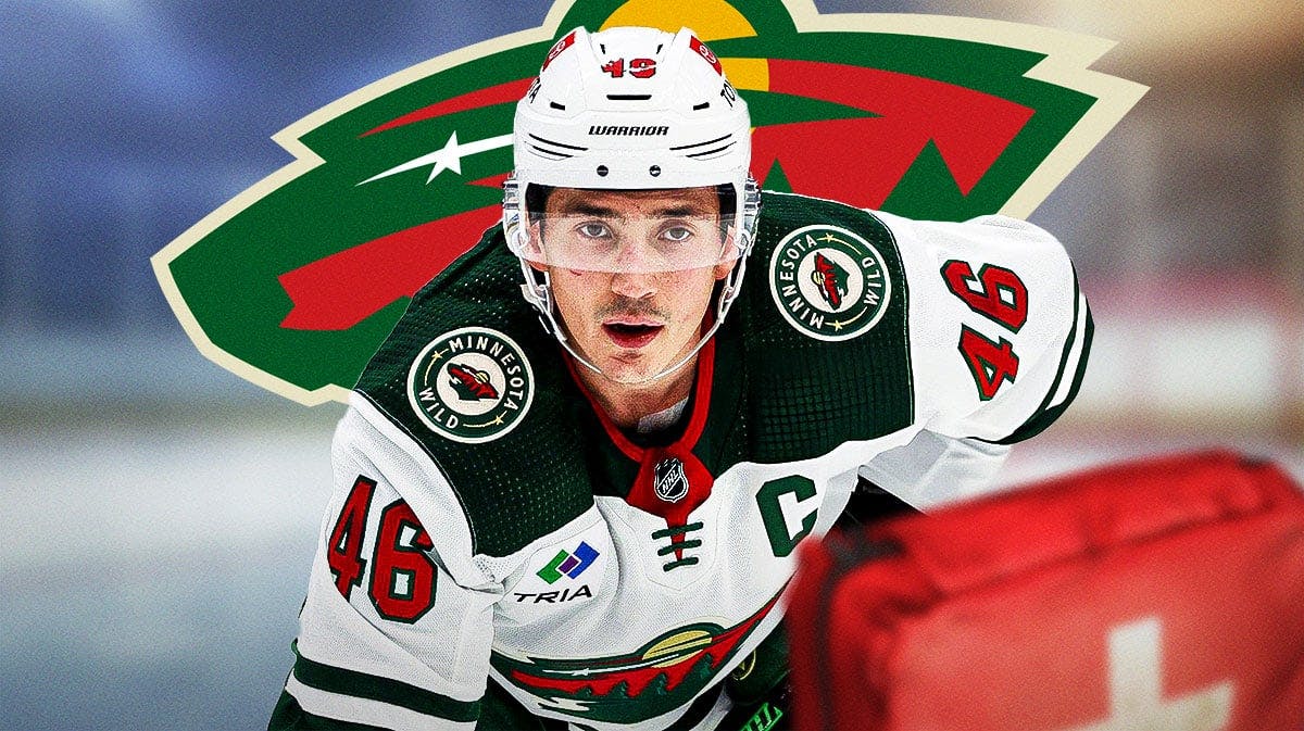 Jared Spurgeon in middle of image looking stern, first aid kit in image, Minnesota Wild logo, hockey rink in background