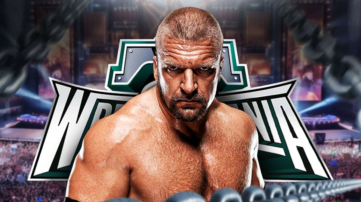 Triple H in front of the WrestleMania 40 logo.