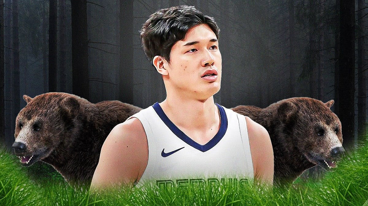Memphis Grizzlies' forward Yuta Watanabe with grizzly bears with him.