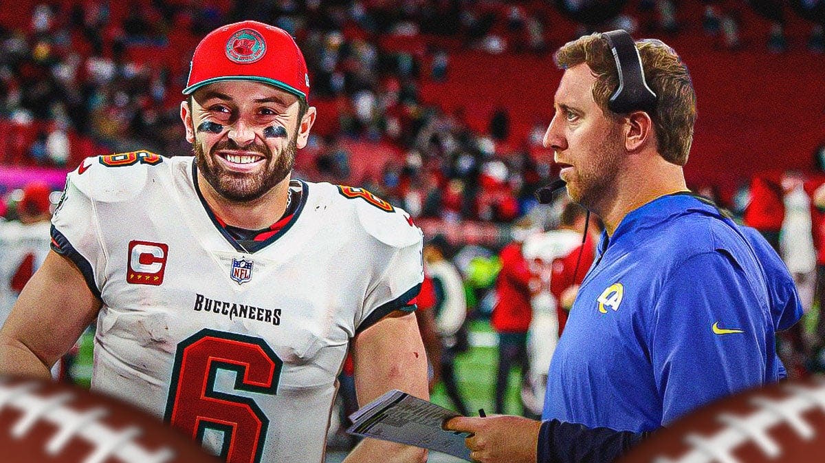 Buccaneers QB Baker Mayfield with OC Liam Coen looking at him.