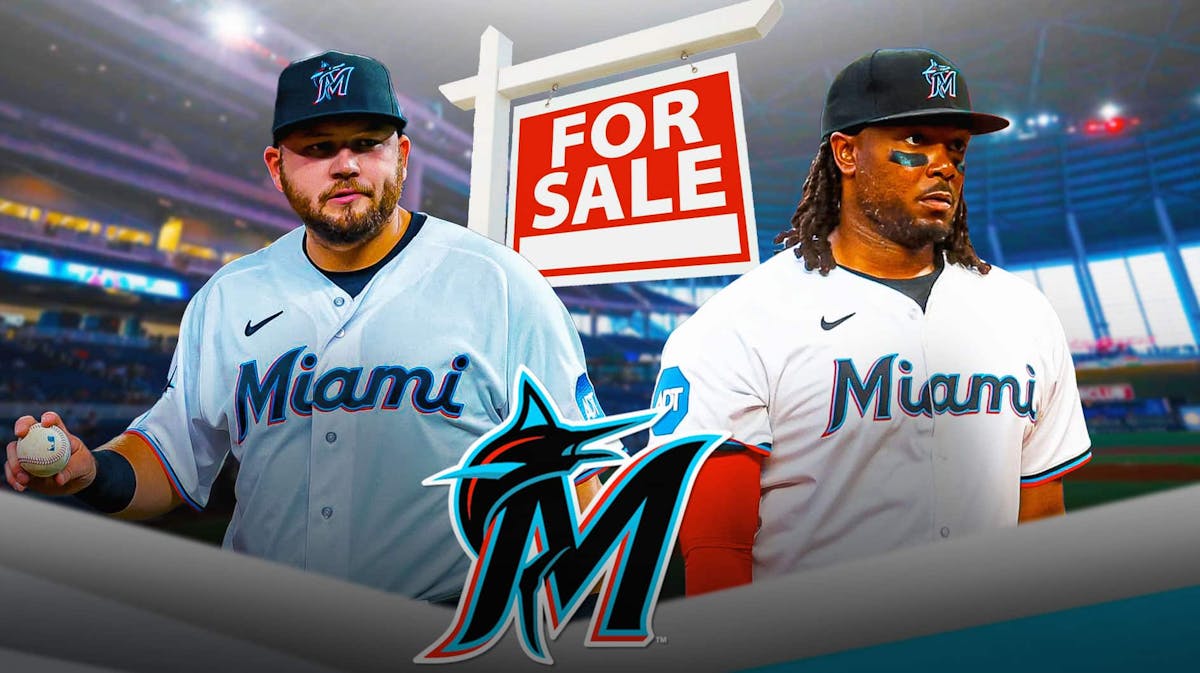 Marlins Jake Burger and Josh Bell next to a for sale sign