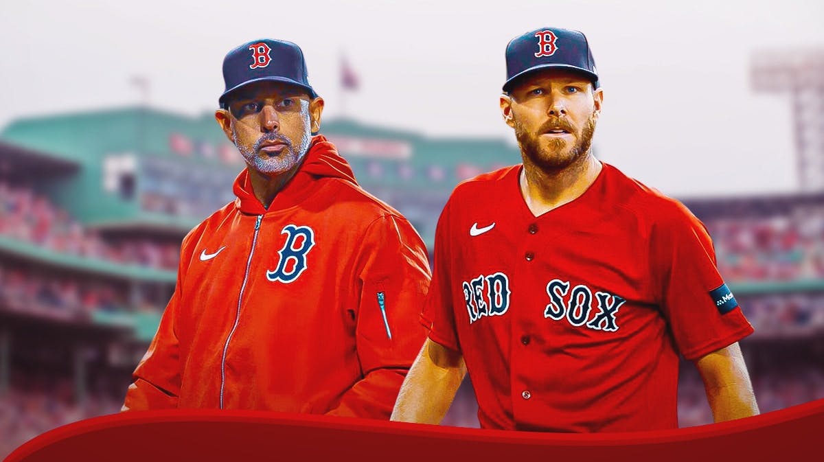 Boston Red Sox manager Alex Cora next to Chris Sale in his former uniform in front of Fenway Park.