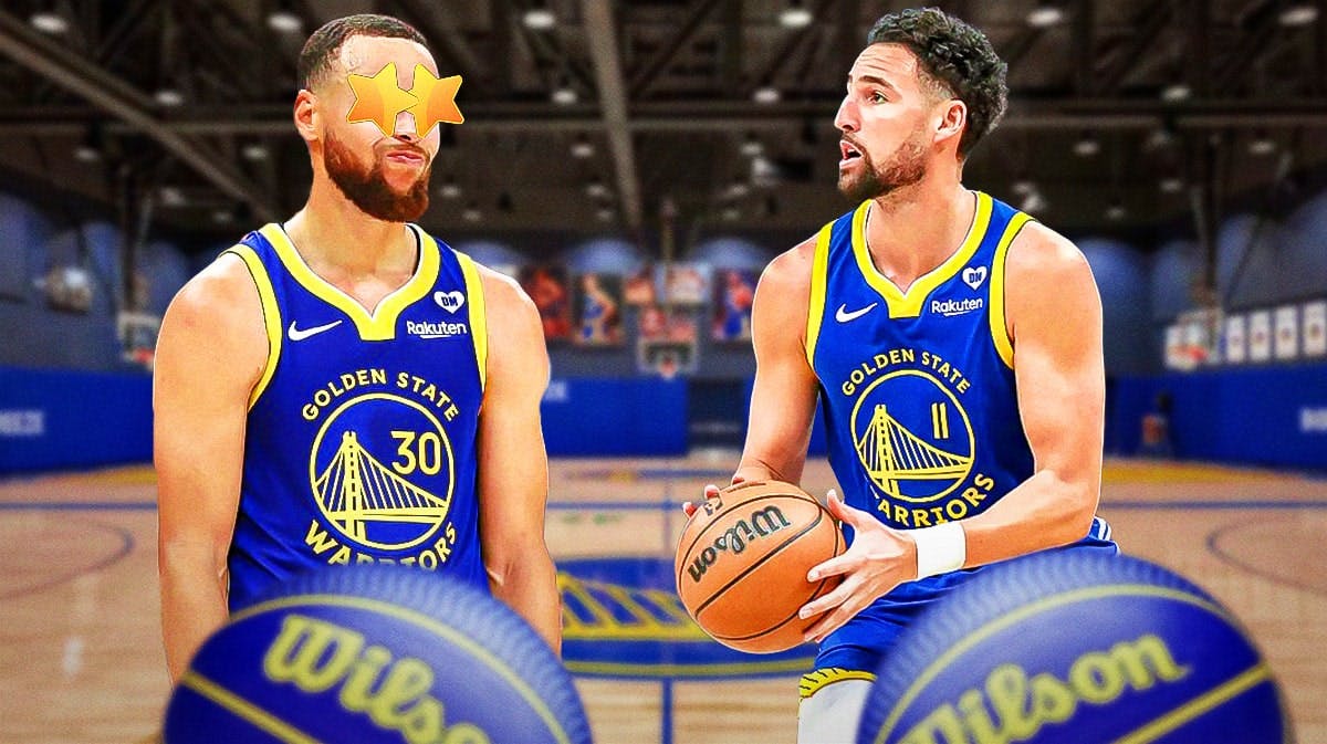 Warriors' Stephen Curry with stars in his eyes looking at Warriors' Klay Thompson shooting a basketball.