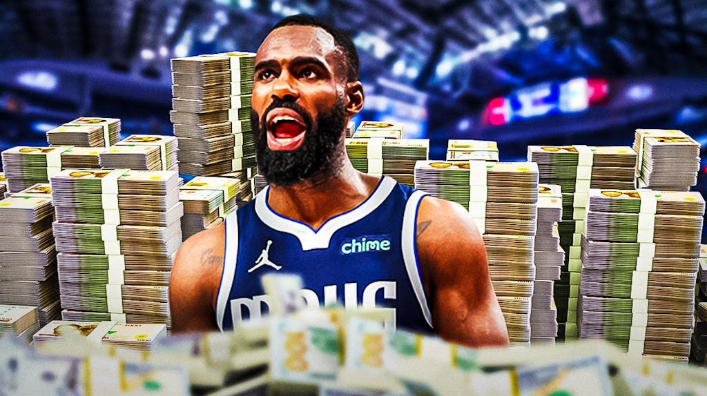 Tim Hardaway Jr. surrounded by piles of cash.