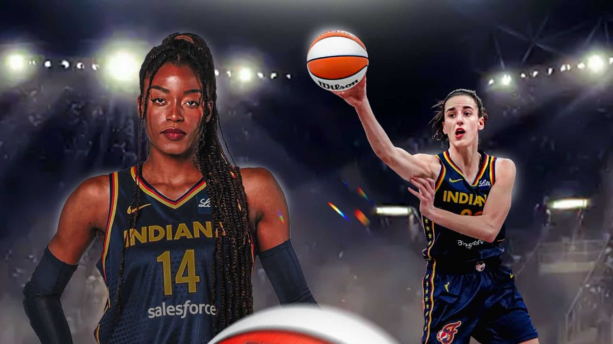 Caitlin Clark in fever jersey passing to a scoring Temi Fagbenle also in a fever jersey